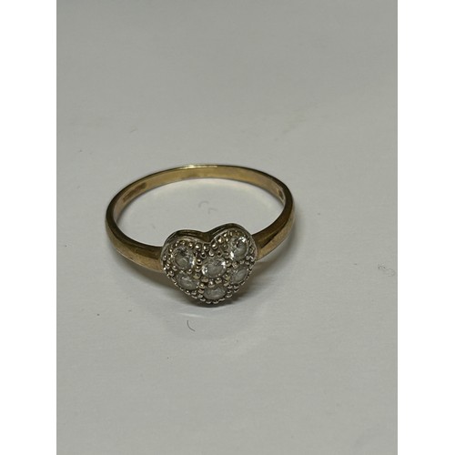 13 - 9CT GOLD HEART SHAPE RING WITH WHITE STONES SIZE T WEIGHT 1.86GR