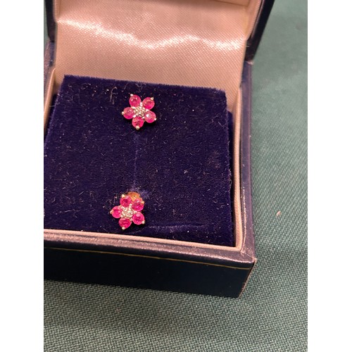 17 - A PAIR OF DIAMOND RUBY AND 9CT GOLD EARRINGS