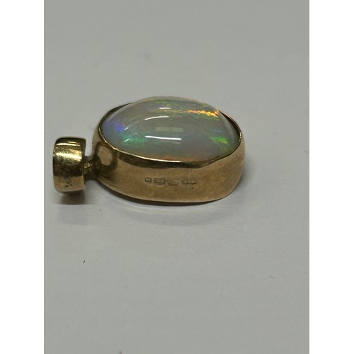 14 - FIRE OPAL .57 CRT 10 X 5 MM set in 9CT GOLD PENDANT PLENTY OF COLOURS LOTS OF FIRE RED, GREEN, BLUE ... 