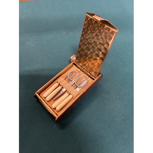 37 - A LADIES VINTAGE ART DECO MUSICAL COMPACT, COMPLETE MANICURE SET, AND LIPSTICK  .