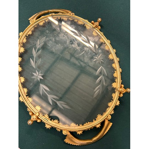 9 - A VERY ORNATE GILT AND ENGRAVED GLASS SERVING TRAY