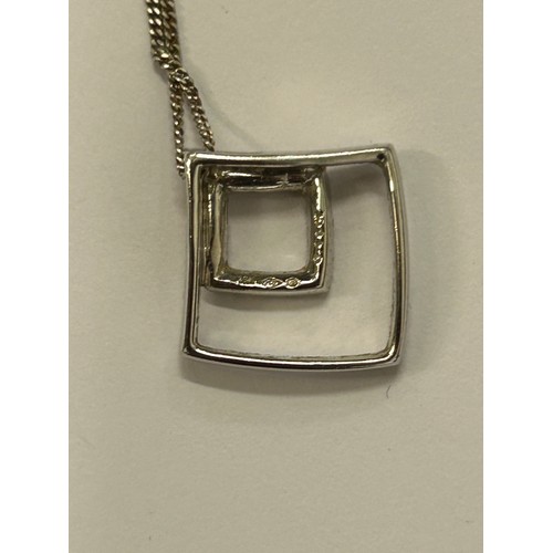 10 - AN 18ct WHITE GOLD 16 DIAMOND DESIGNER PENDANT ON 18ct WHITE GOLD CHAIN WEIGHT 4.25gr