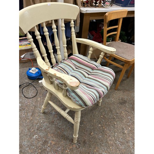 349 - PINE CARVER CHAIR. CREAM PAINTED WITH CUSHION