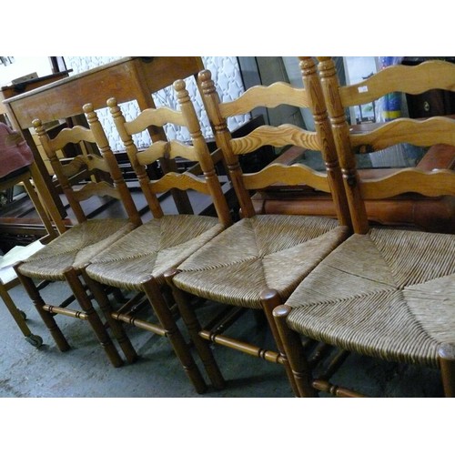 433 - 4 X PINE KITCHEN CHAIRS WITH RUSH SEATS, LADDER BACKS.