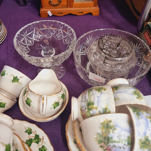 153 - TWO COLCLOUGH BONE CHINA TEA SERVICES, IVY LEAF AND COUNTRY SCENE & GLASS BOWLS