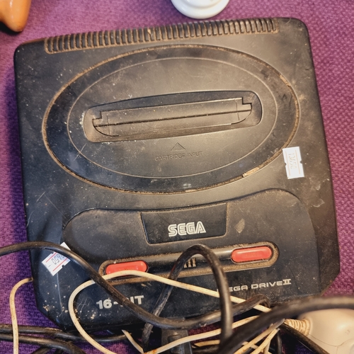 118A - SEGA 16 BIT MEGA DRIVE 2 WITH TWO CONTROLLERS