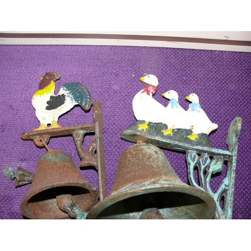 64 - 2 VINTAGE CAST IRON BELLS ON WALL BRACKETS WITH DUCKS AND CHICKENS