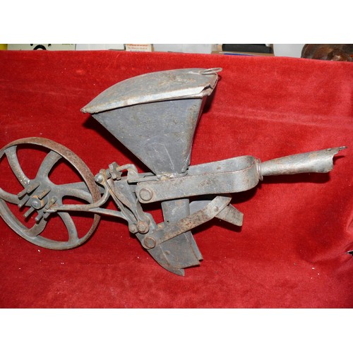 65 - VINTAGE CAST IRON SEEDER IN WORKING ORDER