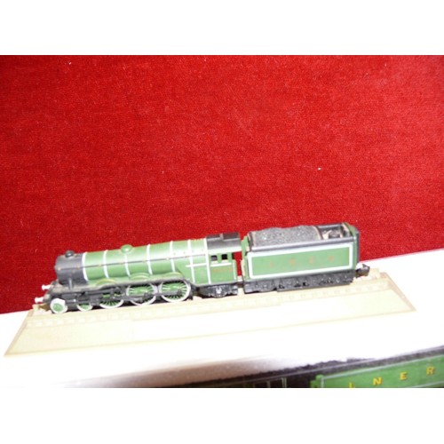 84 - A LNER FLYING SCOTSMAN MODEL IN ORIGINAL PACKAGING PLUS  A SMALLER ONE