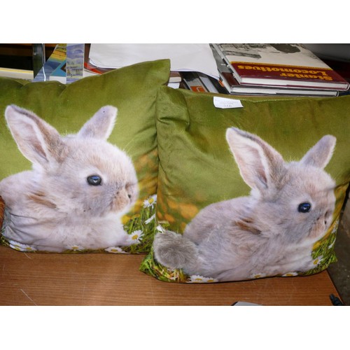 216 - A PAIR OF BUNNY RABBIT CUSHIONS WITH FLUFFY TAIL