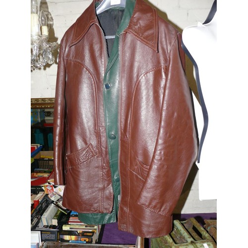 277 - A VINTAGE GREEN LEATHER COAT AND A FUTHER BROWN ONE