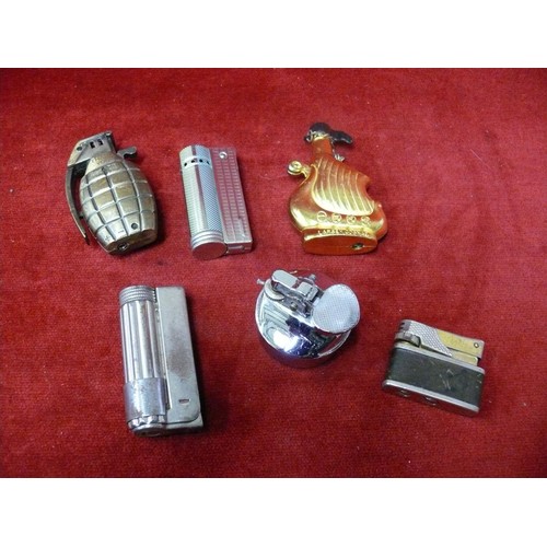 52 - 6 NOVELTY TABLE LIGHTERS TO INCLUDE 1 AS A GRENADE AND 1 A SHIP