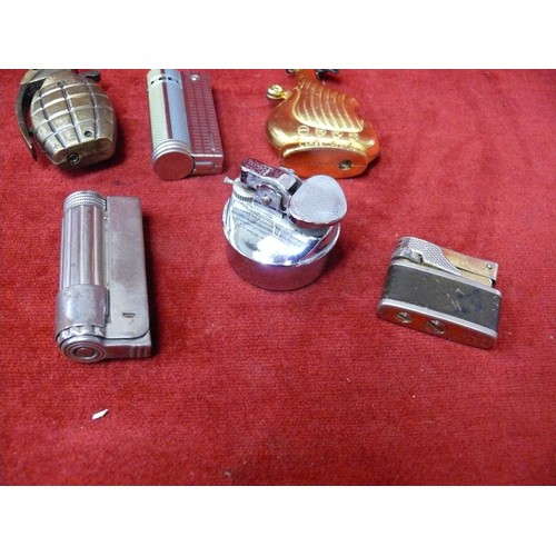 52 - 6 NOVELTY TABLE LIGHTERS TO INCLUDE 1 AS A GRENADE AND 1 A SHIP