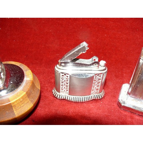 57 - 4 GOOD QUALITY TABLE LIGHTERS