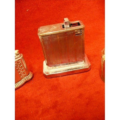 57 - 4 GOOD QUALITY TABLE LIGHTERS