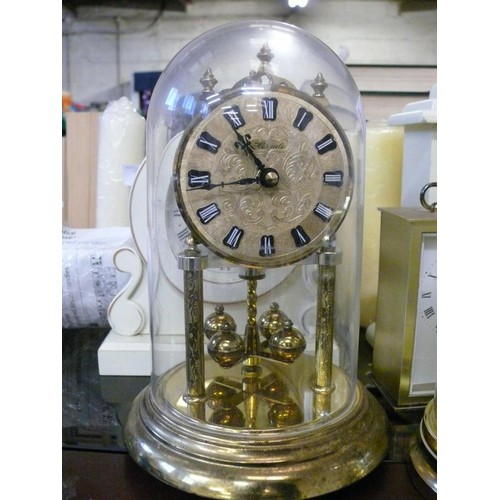 261 - A METAL CASED CARRIAGE CLOCK PLUS ONE OTHER AND A DOME MANTLE CLOCK