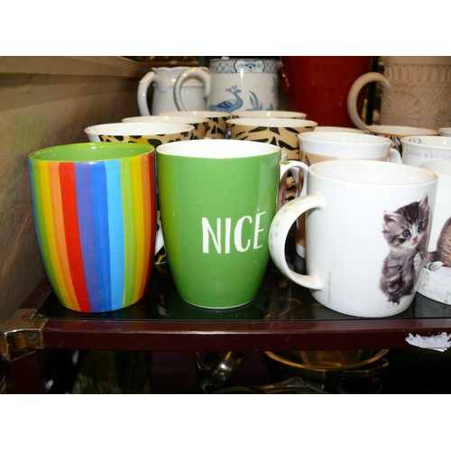 300 - LARGE COLECTION OF FINE CHINA AND CERAMIC MUGS TO INCLUDE TIGER/LEOPARD PRINT, GOLFING ETC