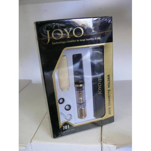 97 - LARGE COLLECTION OF BRAND NEW JOYO CIGARETTE HOLDERS