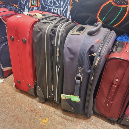 45 - COLLECTION OF 6 SUITCASES WITH WHEELS