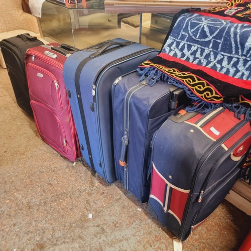 46 - COLLECTION OF 5 SUITCASES WITH WHEELS