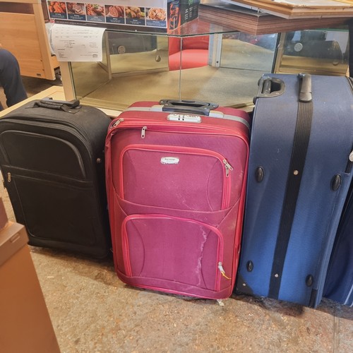 46 - COLLECTION OF 5 SUITCASES WITH WHEELS