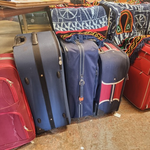 46 - COLLECTION OF 5 SUITCASES WITH WHEELS