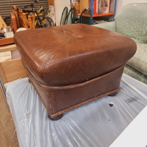 410A - BROWN LEATHER FOOTSTOOL