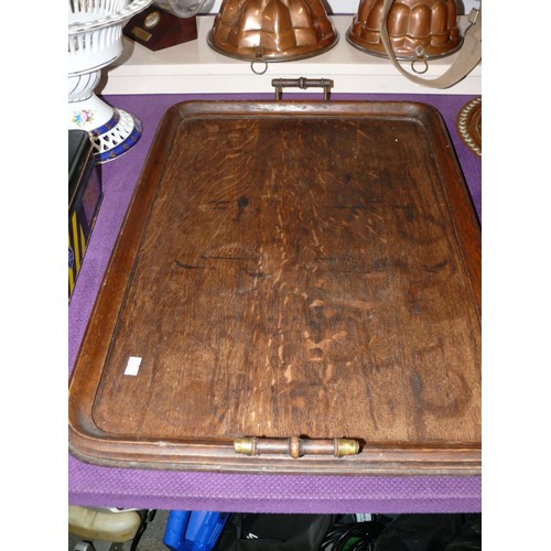 66 - A LARGE OAK TEA TRAY WITH BRASS FERRULES TO THE HANDLES