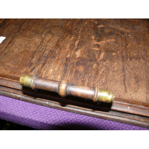 66 - A LARGE OAK TEA TRAY WITH BRASS FERRULES TO THE HANDLES