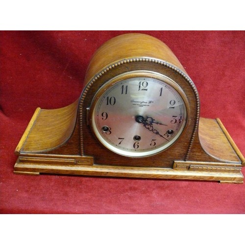 82 - A LOVELY EXAMPLE OF A NAPOLEONS HAT MANTLE CLOCK IN LIGHT OAK WITH COCK BEAD DETAIL AND A WESTMINSTE... 