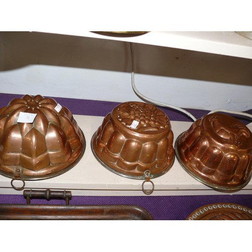 72 - 3 VINTAGE COPPER JELLY CULINARY MOULDS, FEATURING  A GEOMETRIC DESIGN , FRUIT AND A CHICKEN.