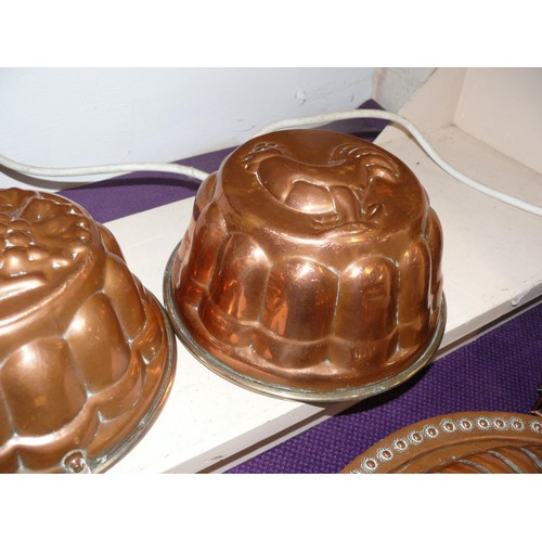 72 - 3 VINTAGE COPPER JELLY CULINARY MOULDS, FEATURING  A GEOMETRIC DESIGN , FRUIT AND A CHICKEN.