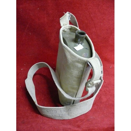 75 - A MILITARY WATER CANTEEN IN A KHAKI SHOULDER CARRY CASE