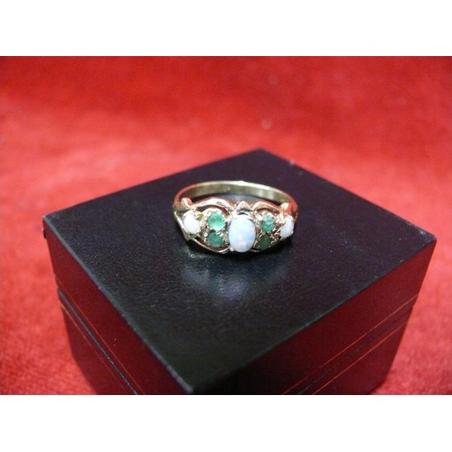 11 - A REALLY BEAUTIFUL 3 FIRE OPAL AND 4 EMERALDS SET IN 9ct GOLD RING. THESE OPALS ARE EXTREMELY GOOD B... 