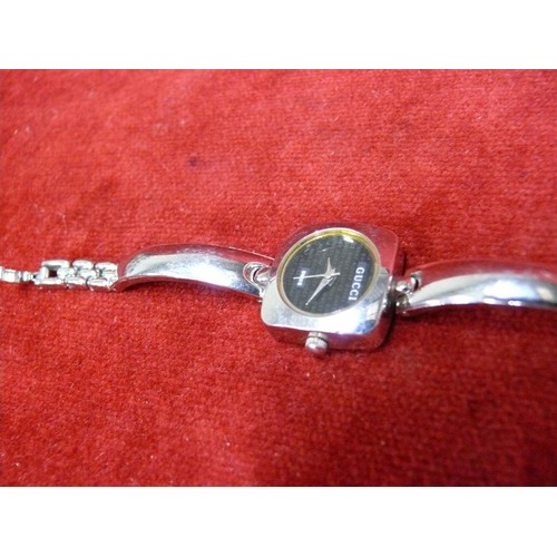 13 - A GENUINE GUCCI   WATCH STAINLESS STEEL