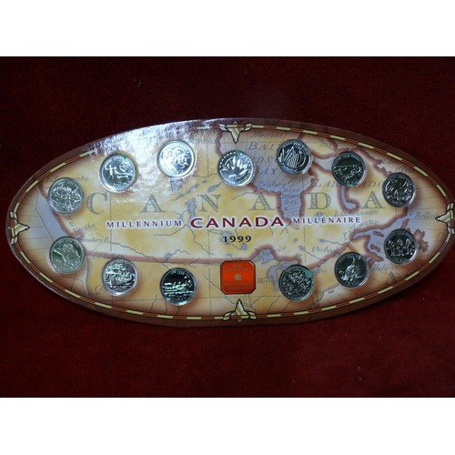 25 - FROM THE ROYAL CANADIAN MINT THE FIRST DESIGNS FOR MILLENNIUM 1999 13 DIFFERENT COINS  ON DISPLAY FR... 