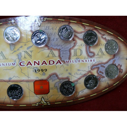 25 - FROM THE ROYAL CANADIAN MINT THE FIRST DESIGNS FOR MILLENNIUM 1999 13 DIFFERENT COINS  ON DISPLAY FR... 