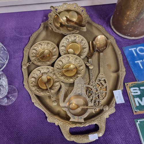 79 - ORNATE BRASS TRAY WITH BOWL AND NIPS SMALLBOWLS WITH SPOONS, 2 SERVERS AND A BRASS ASHTRAY