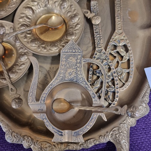 79 - ORNATE BRASS TRAY WITH BOWL AND NIPS SMALLBOWLS WITH SPOONS, 2 SERVERS AND A BRASS ASHTRAY