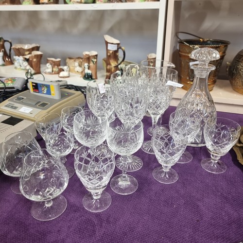 80 - CRYSTAL, A LOVELY SET OF CRYSTAL GLASSES INCLUDING, TUMBLERS, WINE GLASSES, BRANDY GASSES, A LARGE J... 