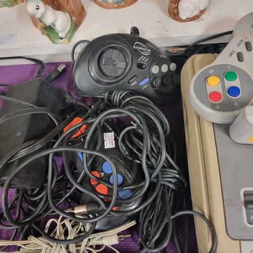 82 - NINTENDO , SUPER NINTENDO ENTERTAINMENT SYSTEM, MODEL SNPS-001A (UK V). COMES WITH SUPER MARIOWORLD ... 