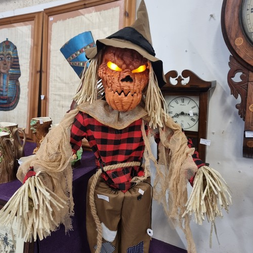 93 - SCARECROW FIGURE HE'S 43 INCH TALL,  ANIMATED WITH SOUND AND LIGHT HE SPEAKS 4 SCARY PHRASES.