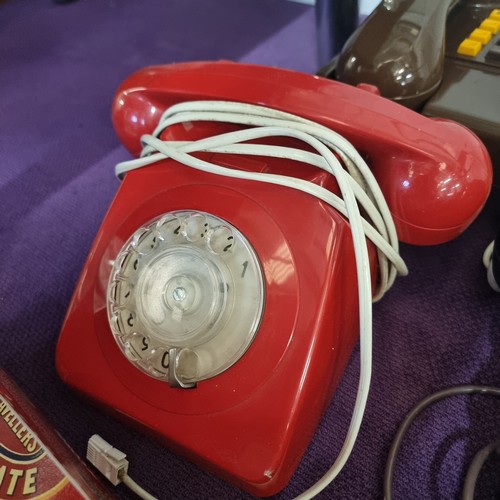 119 - 4 VINTAGE TELEPHONES IN VARIOUS COLOURS.