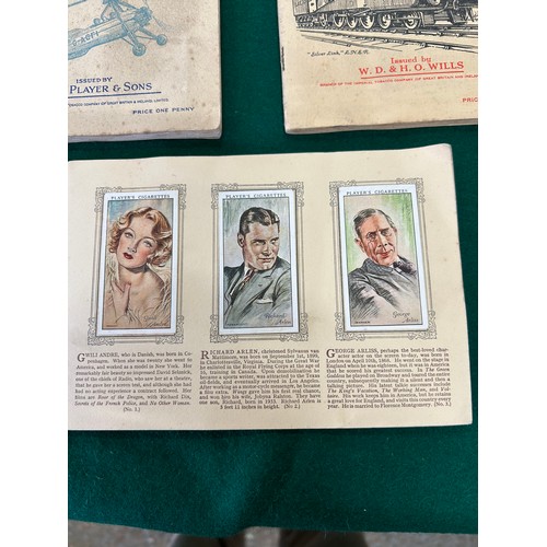 12 - THREE CIGARETTE CARD ALBUMS TO INCLUDE AN ALBUM OF FILM STARS BY JOHN PLAYER (COMPLETE) AN ALBUM OF ... 