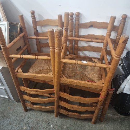 577 - SET OF 4 PINE LADDERBACK CHAIRS WITH WICKER SEATS (one seat missing)