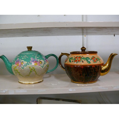 81 - 2 X HAND PAINTED TEAPOTS 1930'S, ONE IN TURQUOISE AND PINK, MADE IN ENGLAND AND SIGNED AND THE OTHER... 