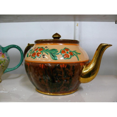 81 - 2 X HAND PAINTED TEAPOTS 1930'S, ONE IN TURQUOISE AND PINK, MADE IN ENGLAND AND SIGNED AND THE OTHER... 