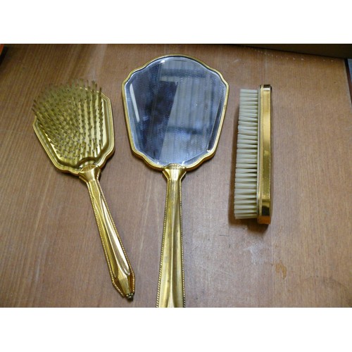 109 - RETRO BRUSHES AND MIRROR SET, NICE EXAMPLE WITH LACE INSERT TO THE MIRROR AN FINISHED IN GILT