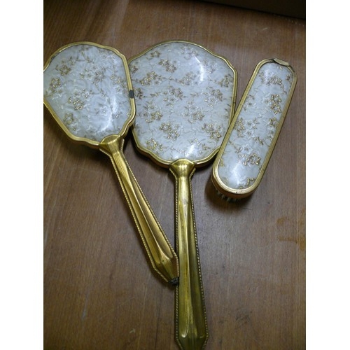 109 - RETRO BRUSHES AND MIRROR SET, NICE EXAMPLE WITH LACE INSERT TO THE MIRROR AN FINISHED IN GILT