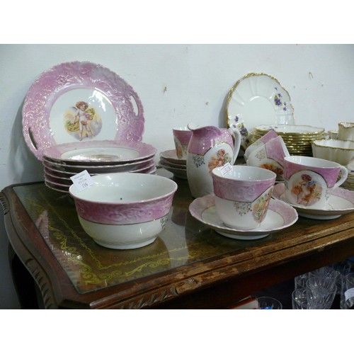 116 - CHERUB CHINA PART TEA SET COMPRISING OF A PLATTER, JUG AND BOWL, 6 TEA PLATES, 6 SAUCERS AND 5 CUPS ... 